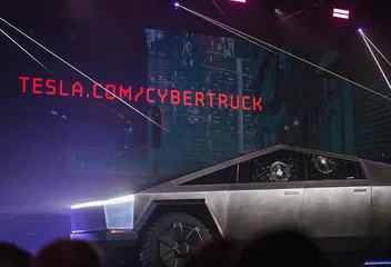 The Cybertruck prototype on its 2019 reveal stage with two shattered side windows